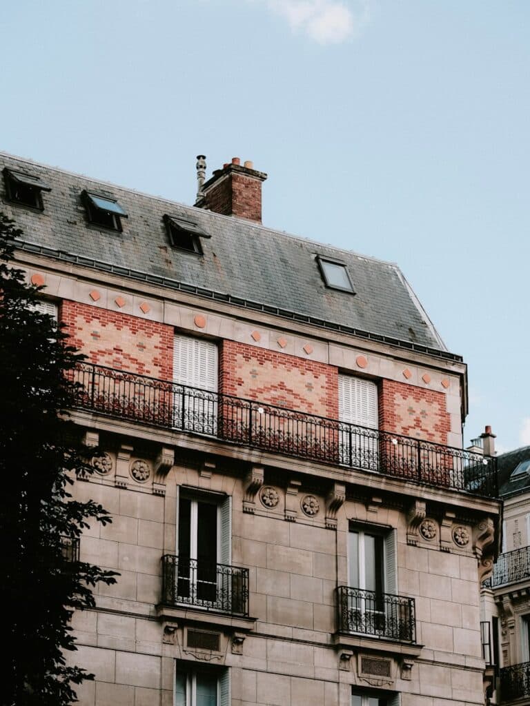 a building with a balcony in paris